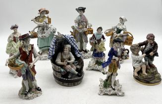 A collection of various antique figurines including Samson, Niderviller style cherubs, Meissen style