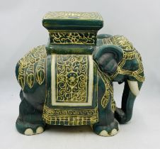 A decorative pottery elephant - height 44cm.