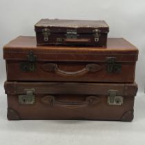 Three vintage leather suitcases (smallest in need of attention).