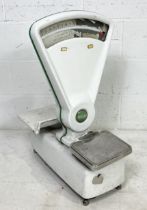 A large set of vintage Avery counter top scales