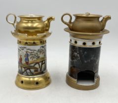 Two porcelain Veilleuse teapots, one with Eastern scenes with castle shaped stand and gilt