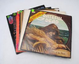 A collection of six 12" vinyl record albums by The Grateful Dead, including 'Wake Of The Flood', '