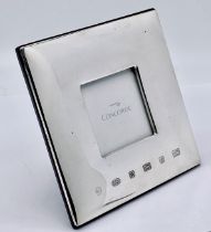 A boxed Concorde hallmarked silver photo frame by Carrs silver in original box