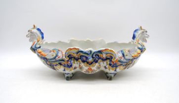 A 19th Century French Desvres faience ceramic jardiniere, with figural ends - length 42cm, height