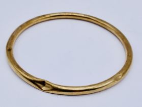 A 9ct rose gold bangle, weight 6.9g