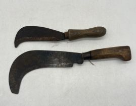 Two vintage Billhooks, one is marked "Elwell 458369"