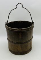 An antique well bucket