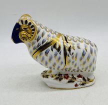 A Royal Crown Derby paperweight in the form of a ram