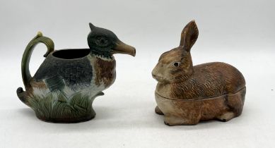An antique Majolica pitcher in the form of a duck, marked CR to base along with a similar style
