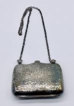 A hallmarked silver purse