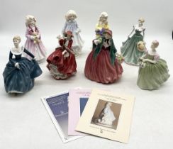 A collection of Royal Doulton ladies and figurines comprising of Charity (HN3087), Hope (HN3061) A/