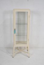 An Ikea metal framed lockable display cabinet, with key - length 56cm, depth 48cm, height 152cm