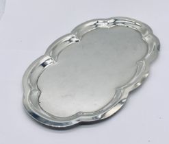 A "Sterling by Poole" silver dish/tray, weight 150g, length 23.5cm