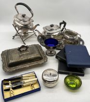 A collection of various silver plated items including tea service, cutlery, serving dish etc.