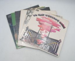 A collection of six 12" vinyl record albums by The Velvet Underground and Lou Reed, including '