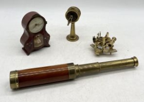 A four drawer telescope marked Brooks of Lonson, miniature modern sextant, Peter dancing ballerina