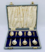 A cased set of hallmarked silver coffee spoons