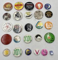 A collection of vintage button/pin badges mainly from the 1970's on the theme of political