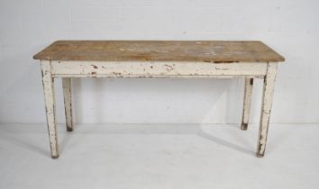 A rustic pine farmhouse table, with three plank top, raised on tapering legs - length 183cm, depth