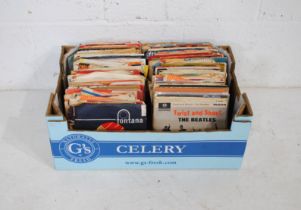 A quantity of various 7" vinyl records, including Johnny Cash & The Tennessee Two, The Beatles,