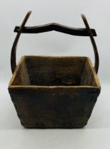 An Oriental wooden rice bucket - approx. height 54cm