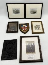 A collection of various framed photographs and etchings along with a French cast iron plaque etc.