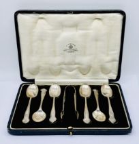 A cased set of Mappin & Webb hallmarked silver spoons with sugar tongs