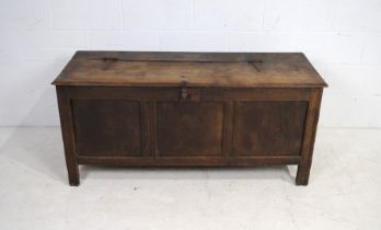 An antique oak coffer - length 138cm, depth 53cm, height 63cm