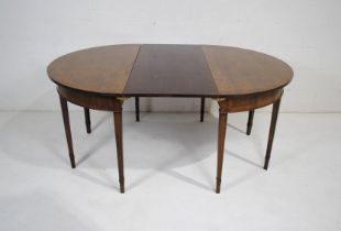 A Georgian mahogany D end sectional dining table, with one leaf, raised on tapering legs - length