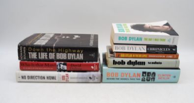 A collection of eight books relating to Bob Dylan