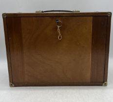 An engineers vintage wooden multi-drawer tool box with front cover and key.