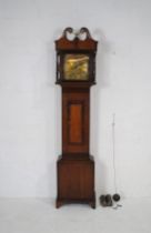 A Georgian oak longcase clock, with ornate brass dial and gilt eagle finial, with keys - height