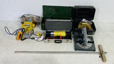 A collection of power tools including two grinders, a mitre saw, a circular saw, a bench grinder,
