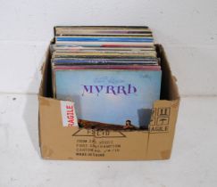 A collection of 12" vinyl records consisting of mostly prog rock, including Yes, Genesis,