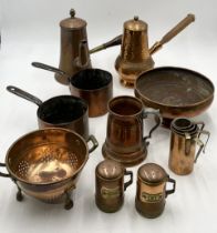 A collection of copper kitchenalia including condiment set, pans, measuring jugs, Coffee pots etc.