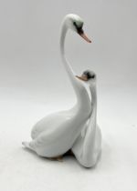 A Herend figurine of two swans