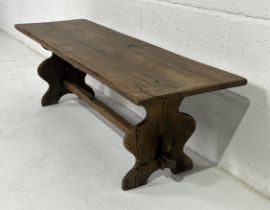 An oak coffee table 33cm x 107cm, height 35cm