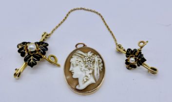 A tested 15ct gold double enamelled brooch with connecting chain (weight 8.3g) along with a 9ct gold