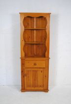 An 'Abacus' modern pine corner unit, with single drawer and cupboard under - length 68.5cm, depth