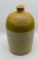A large vintage cider flagon, marked Smith & Tyers - overall height 50cm