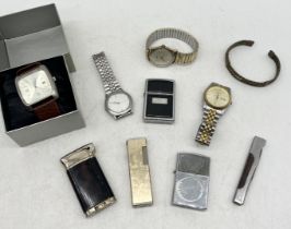 A collection of vintage watches, lighters etc.