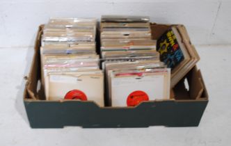 A quantity of various 7" vinyl records, including The Troggs, Johnny & The Hurricanes, Franki Valli,