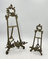 Two Roccoco style brass easels- largest measures 35cm