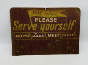 A vintage Pets Centre metal sign - overall size 30cm x 44cm
