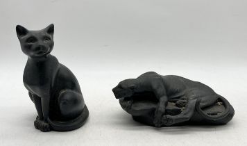 A model of a panther lying on a rock after Clovis Edmond Masson along with a figure of a cat