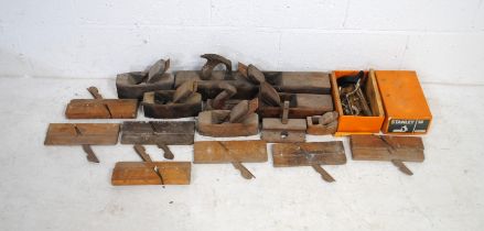 A quantity of vintage wood planes, including a boxed Stanley #50