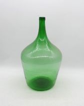 A green glass carboy - height 52cm