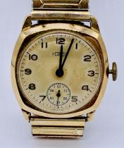 A Hirco vintage 9ct gold wristwatch on expandable strap