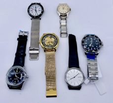 A collection of wristwatches including Skagen, Smiths Empire etc.