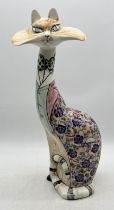 A David Sharp for Cinque Ports Pottery cat figurine with floral decoration